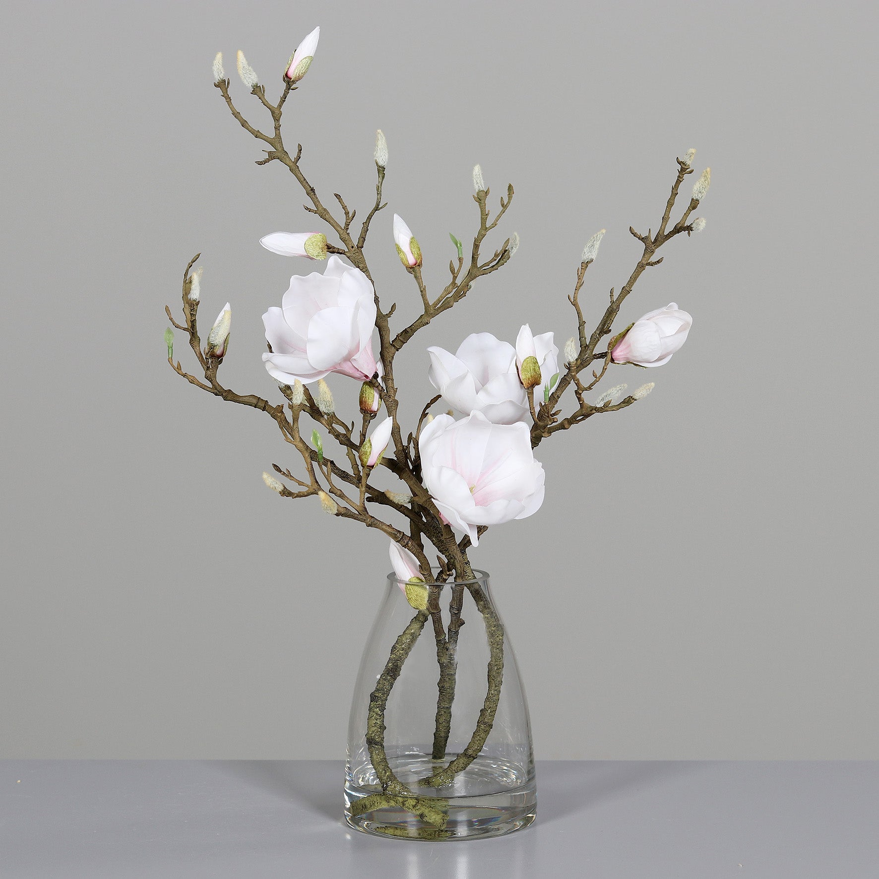 Aranjament premium cu magnolii artificiale albe in vas de sticla 50 cm