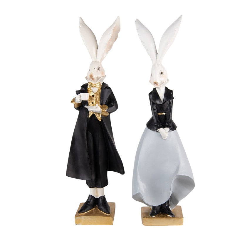 Set de doua figurine decorative de Paste reprezentand un cuplu de iepurasi imbracati elegant realizati din polirasina de inaltime 47 cm